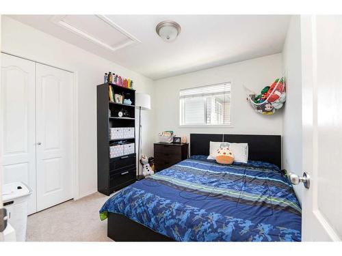 61 Arnold Close, Red Deer, AB - Indoor Photo Showing Bedroom