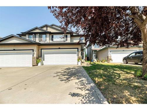 61 Arnold Close, Red Deer, AB - Outdoor With Facade