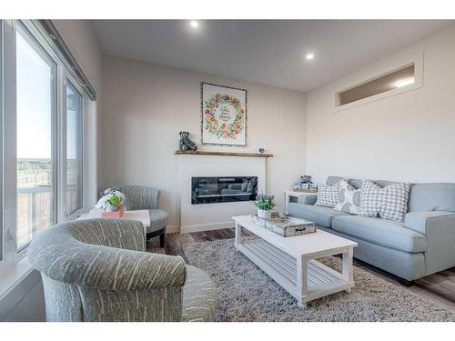 36 Thorkman Avenue, Red Deer, AB - Indoor Photo Showing Living Room With Fireplace