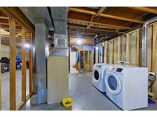 13 Otterbury Avenue, Red Deer, AB - Indoor Photo Showing Laundry Room