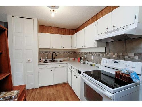 75 Overdown Drive, Red Deer, AB - Indoor Photo Showing Kitchen With Double Sink