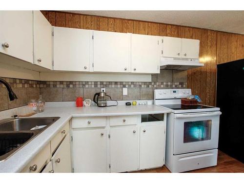 75 Overdown Drive, Red Deer, AB - Indoor Photo Showing Kitchen With Double Sink