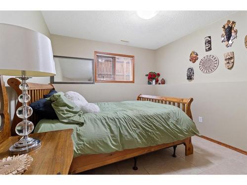 15 Duston Street, Red Deer, AB - Indoor Photo Showing Bedroom