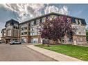 411-4425 Heritage Way, Lacombe, AB  - Outdoor With Balcony With Facade 