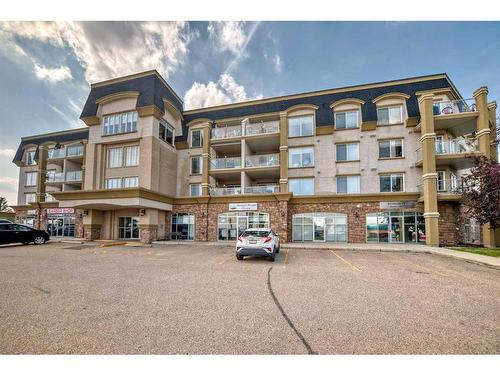 411-4425 Heritage Way, Lacombe, AB - Outdoor With Balcony With Facade