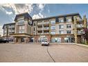 411-4425 Heritage Way, Lacombe, AB  - Outdoor With Balcony With Facade 