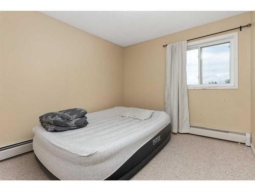 404-5418 52 Street, Camrose, AB - Indoor Photo Showing Bedroom