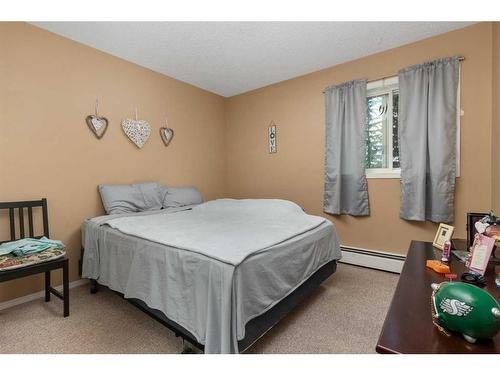 202-5418 52 Street, Camrose, AB - Indoor Photo Showing Bedroom