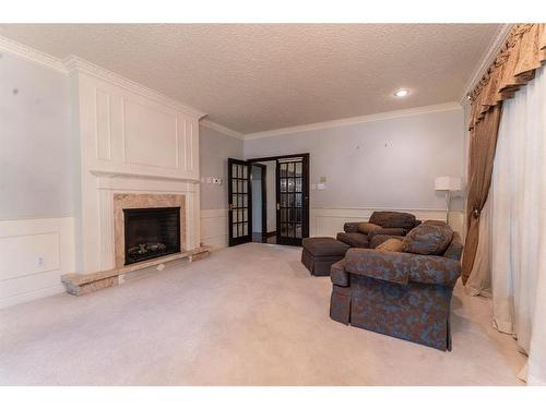 170 Jarvis Bay Drive, Jarvis Bay, AB - Indoor With Fireplace