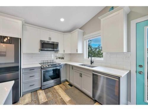 117 Ladwig Close, Red Deer, AB - Indoor Photo Showing Kitchen With Double Sink With Upgraded Kitchen