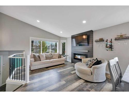 117 Ladwig Close, Red Deer, AB - Indoor Photo Showing Living Room With Fireplace