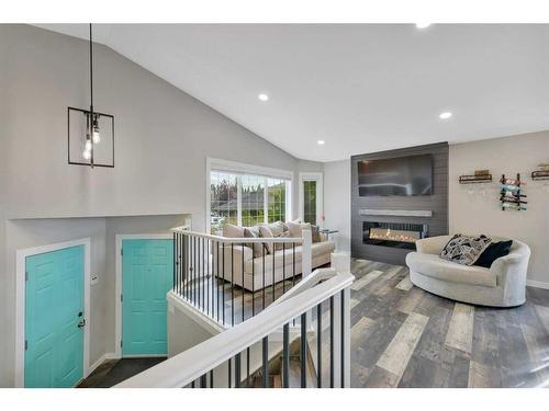 117 Ladwig Close, Red Deer, AB - Indoor Photo Showing Other Room With Fireplace