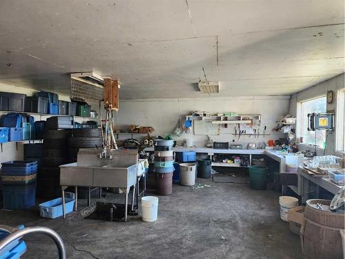 7501 C And E Trail, Innisfail, AB - Indoor Photo Showing Garage