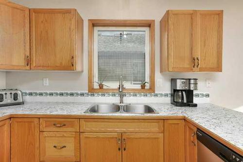 152 Kemp Avenue, Red Deer, AB - Indoor Photo Showing Kitchen With Double Sink