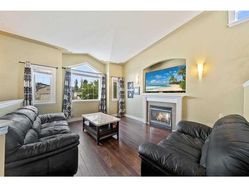 46 Assinger Avenue, Red Deer, AB - Indoor Photo Showing Living Room With Fireplace