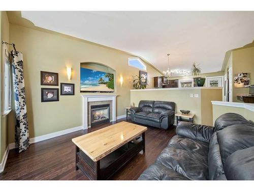 46 Assinger Avenue, Red Deer, AB - Indoor Photo Showing Living Room With Fireplace