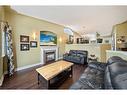 46 Assinger Avenue, Red Deer, AB  - Indoor Photo Showing Living Room With Fireplace 