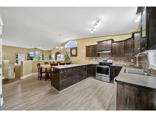 46 Assinger Avenue, Red Deer, AB - Indoor Photo Showing Kitchen With Double Sink With Upgraded Kitchen