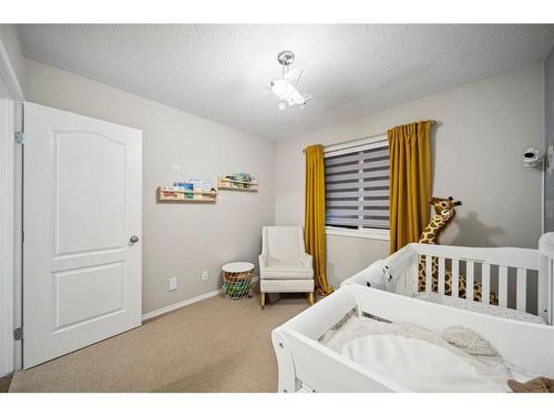 140 Vickers Close, Red Deer, AB - Indoor Photo Showing Bedroom