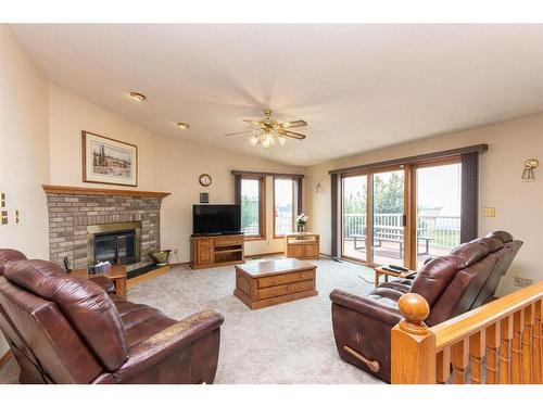 37440 Range Road 264, Rural Red Deer County, AB - Indoor Photo Showing Living Room With Fireplace