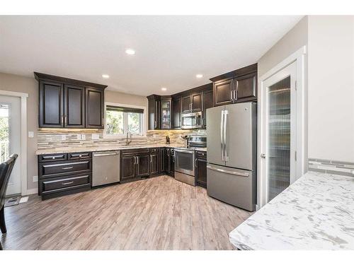 85 Rutledge Crescent, Red Deer, AB - Indoor Photo Showing Kitchen With Stainless Steel Kitchen