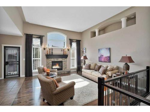 15 Volk Place, Red Deer, AB - Indoor Photo Showing Living Room With Fireplace