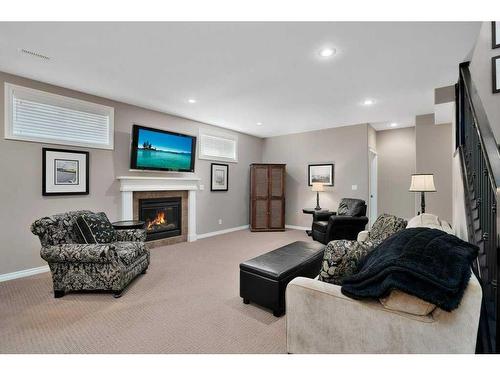 15 Volk Place, Red Deer, AB - Indoor Photo Showing Other Room With Fireplace