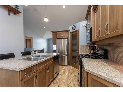 61 Terrace Heights Drive, Lacombe, AB - Indoor Photo Showing Kitchen With Double Sink