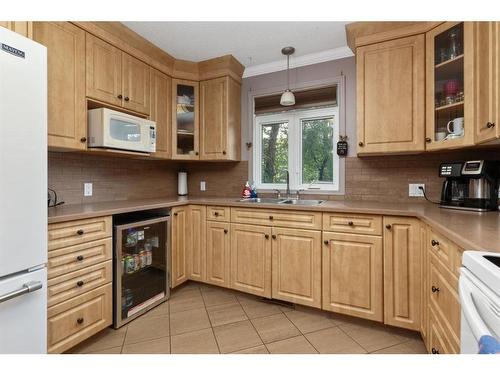 4712 47 Street, Camrose, AB - Indoor Photo Showing Kitchen With Double Sink