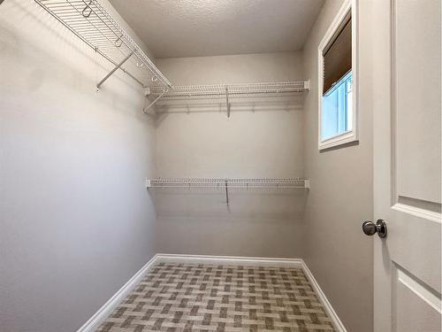 5 Bishop Circle, Carstairs, AB - Indoor With Storage