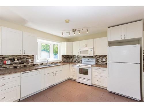 17 Malcolm Crescent, Red Deer, AB - Indoor Photo Showing Kitchen With Double Sink