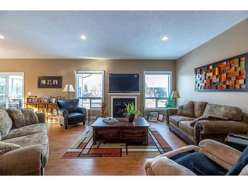 163 Jarvis Bay Drive, Jarvis Bay, AB - Indoor Photo Showing Living Room With Fireplace