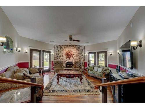 39070 Range Road 281, Rural Red Deer County, AB - Indoor Photo Showing Living Room With Fireplace