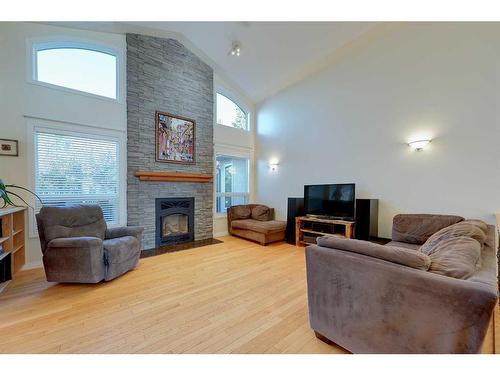 28 Duval Close, Red Deer, AB - Indoor Photo Showing Living Room With Fireplace