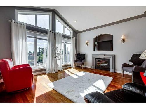 148 Iverson Close, Red Deer, AB - Indoor Photo Showing Living Room With Fireplace