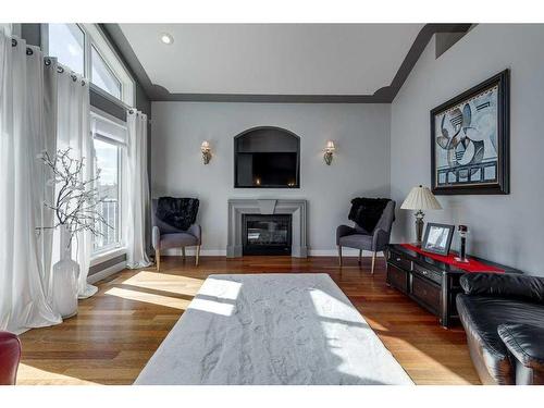 148 Iverson Close, Red Deer, AB - Indoor Photo Showing Living Room With Fireplace