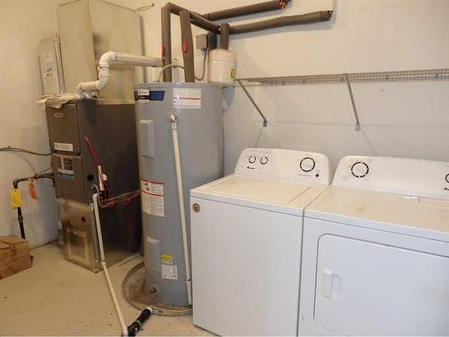 3720 47 Street, Red Deer, AB - Indoor Photo Showing Laundry Room