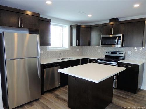 3720 47 Street, Red Deer, AB - Indoor Photo Showing Kitchen With Double Sink With Upgraded Kitchen