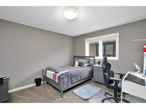 137 Sutherland Close, Red Deer, AB - Indoor Photo Showing Bedroom