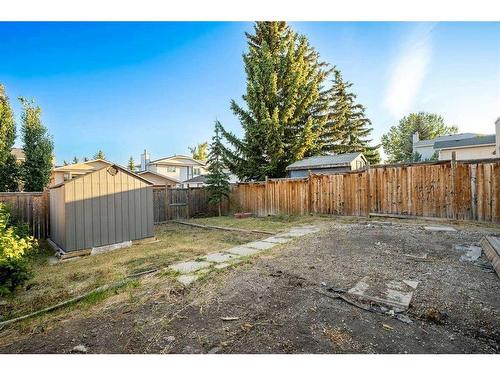 156 Millrise Close Sw, Calgary, AB - Outdoor With Backyard