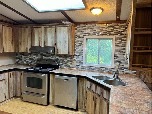 262053 Township Road 444, Rural Ponoka County, AB - Indoor Photo Showing Kitchen With Double Sink