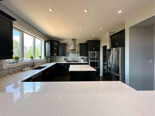 2 Hidden Valley Close, Rural Clearwater County, AB - Indoor Photo Showing Kitchen With Double Sink With Upgraded Kitchen