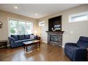 20 Connaught Crescent, Red Deer, AB  - Indoor Photo Showing Living Room With Fireplace 