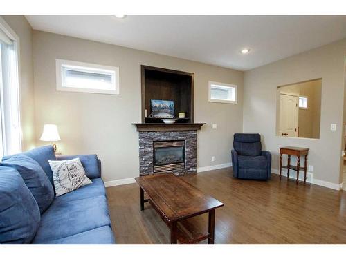 20 Connaught Crescent, Red Deer, AB - Indoor Photo Showing Living Room With Fireplace