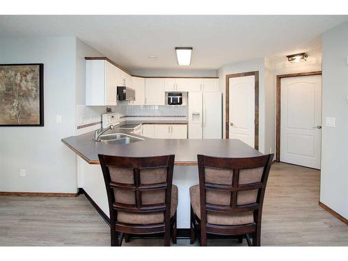 12D-32 Daines Avenue, Red Deer, AB - Indoor Photo Showing Kitchen With Double Sink