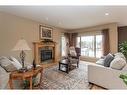 53 Allard Crescent, Red Deer, AB  - Indoor Photo Showing Living Room With Fireplace 