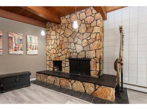 A-3737 50 Street, Red Deer, AB - Indoor With Fireplace