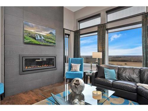 120-38254 Range Road 265, Rural Red Deer County, AB - Indoor Photo Showing Living Room With Fireplace