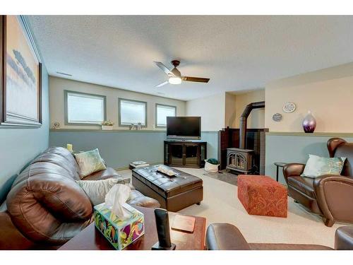 49 Chappel Drive, Red Deer, AB - Indoor Photo Showing Living Room With Fireplace