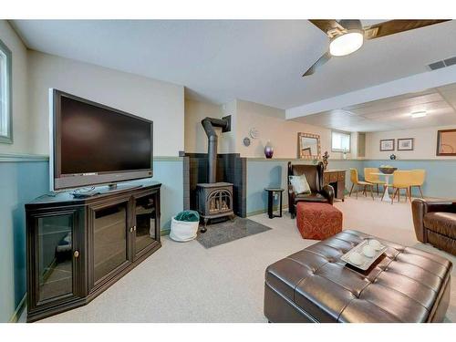 49 Chappel Drive, Red Deer, AB - Indoor Photo Showing Living Room With Fireplace